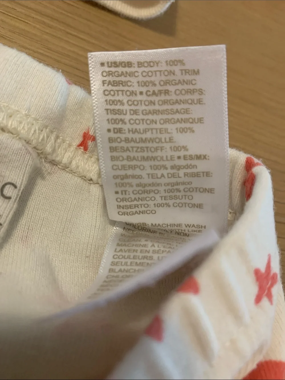 Hanna Andersson 6-12 mo *Organic* pajamas with orange stars